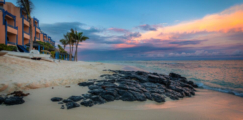 Rocks on Seashore Near a Resort